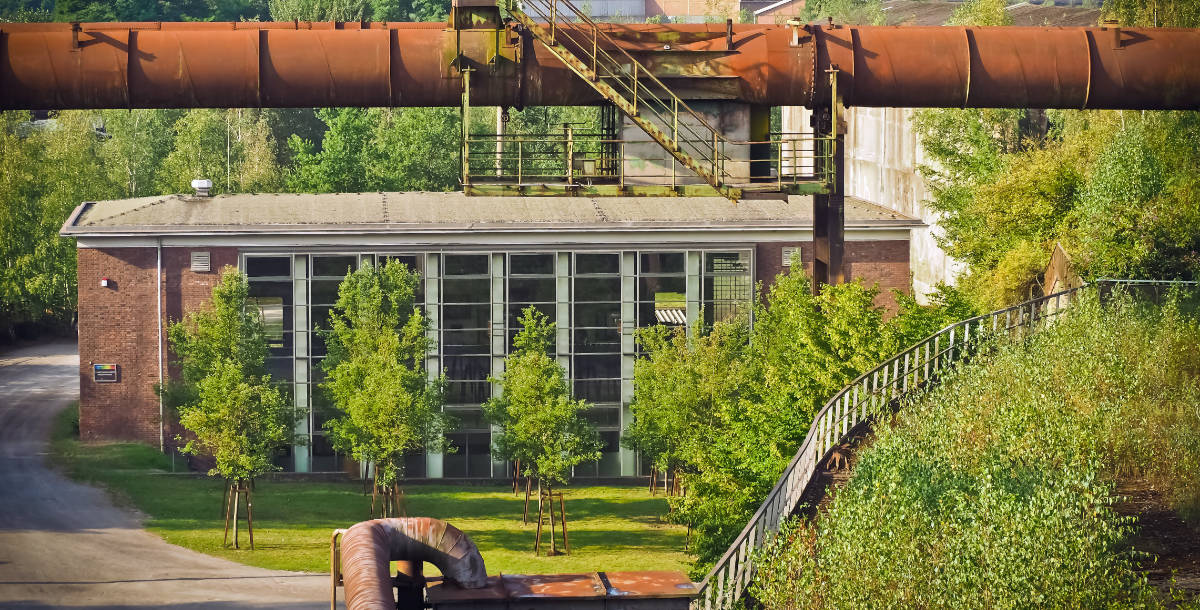 reabilitacao-paisagistica Equipamento industrial desativado com espaços exteriores reabilitados para redução de impactes visuais